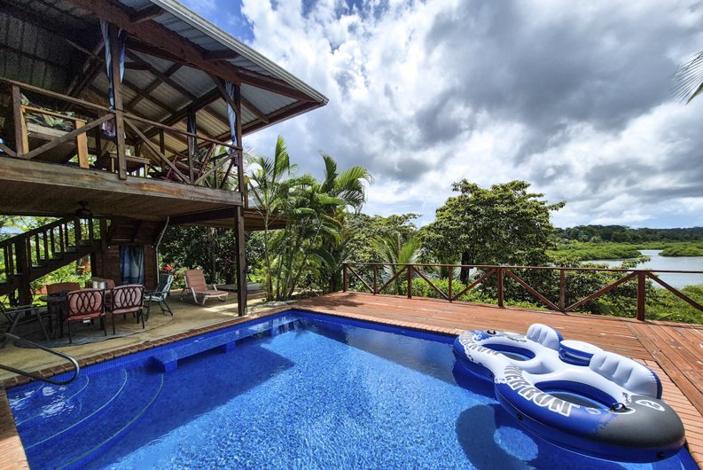 Pool with Caribbean water views